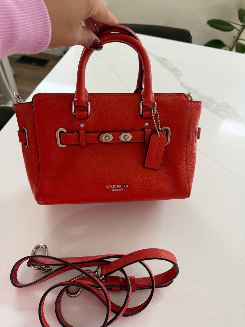 vibrant red Coach Mini Blake Carryall bag